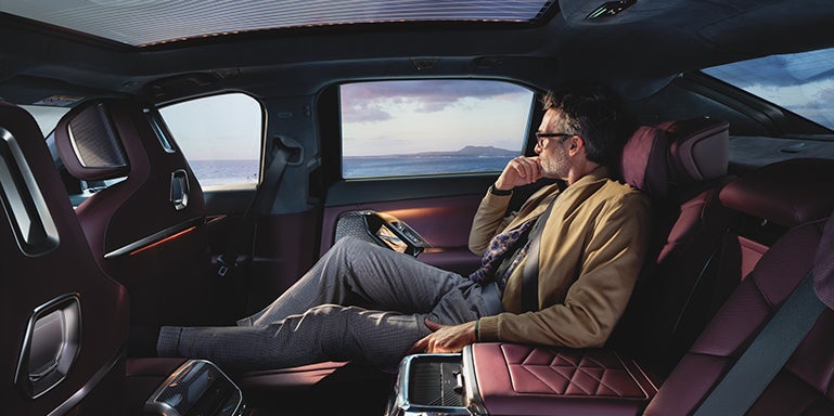 Man sitting in the backseat of an i7 | Flemington BMW in Flemington NJ