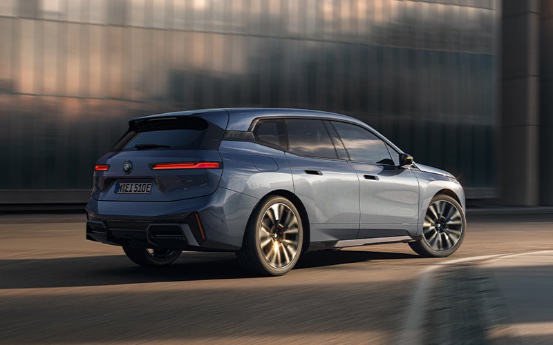 The BMW iX driving with the front wheel turned. | Flemington BMW in Flemington NJ