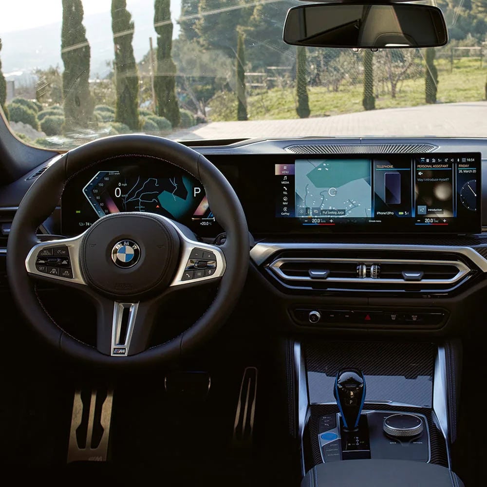 A driver's eye view of steering wheel and controls of the BMW i4 | Flemington BMW in Flemington NJ