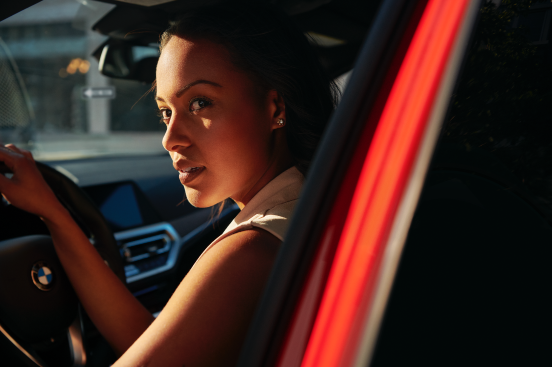 woman driving bmw
